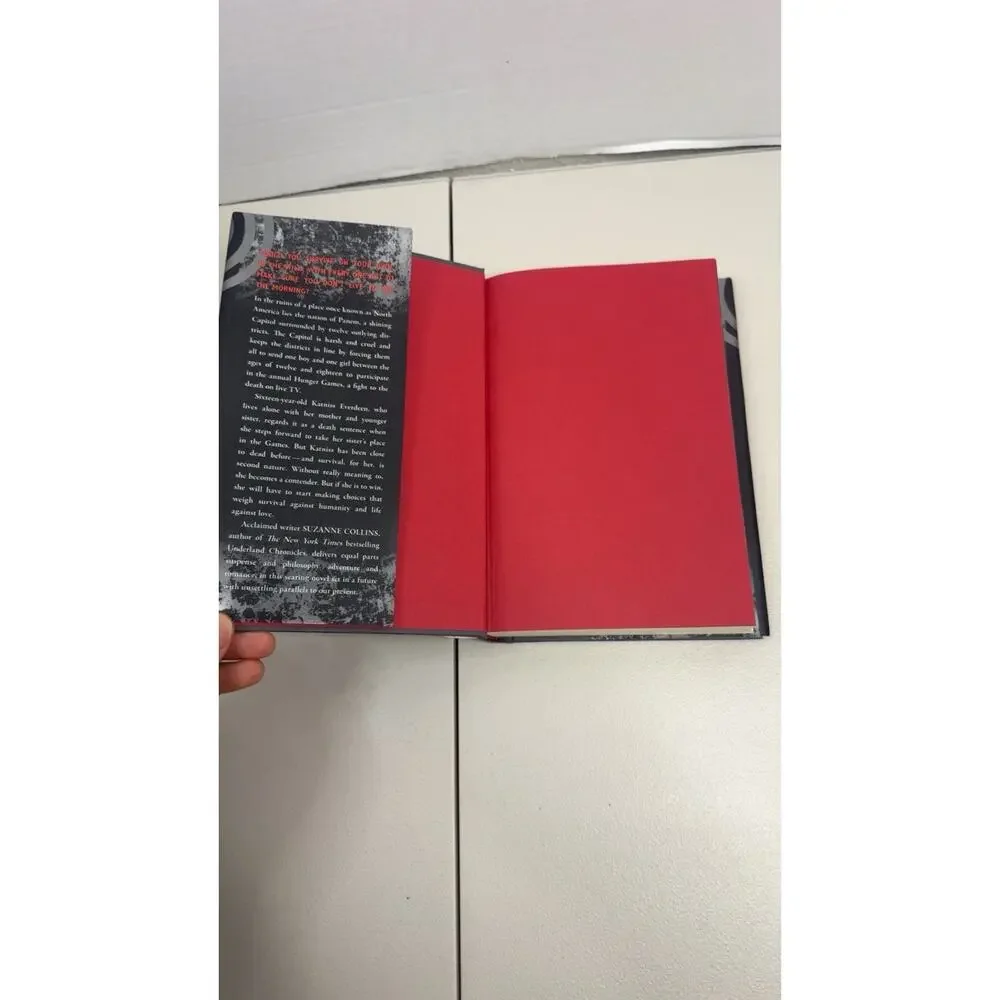 The Hunger Games - Suzanne Collins Scholastic, 2008